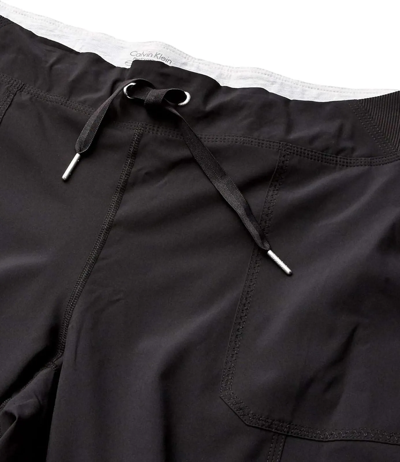 Calvin Klein Women's Premium Performance Rib Cuffed Capri Pant PF7P0777 Black L
