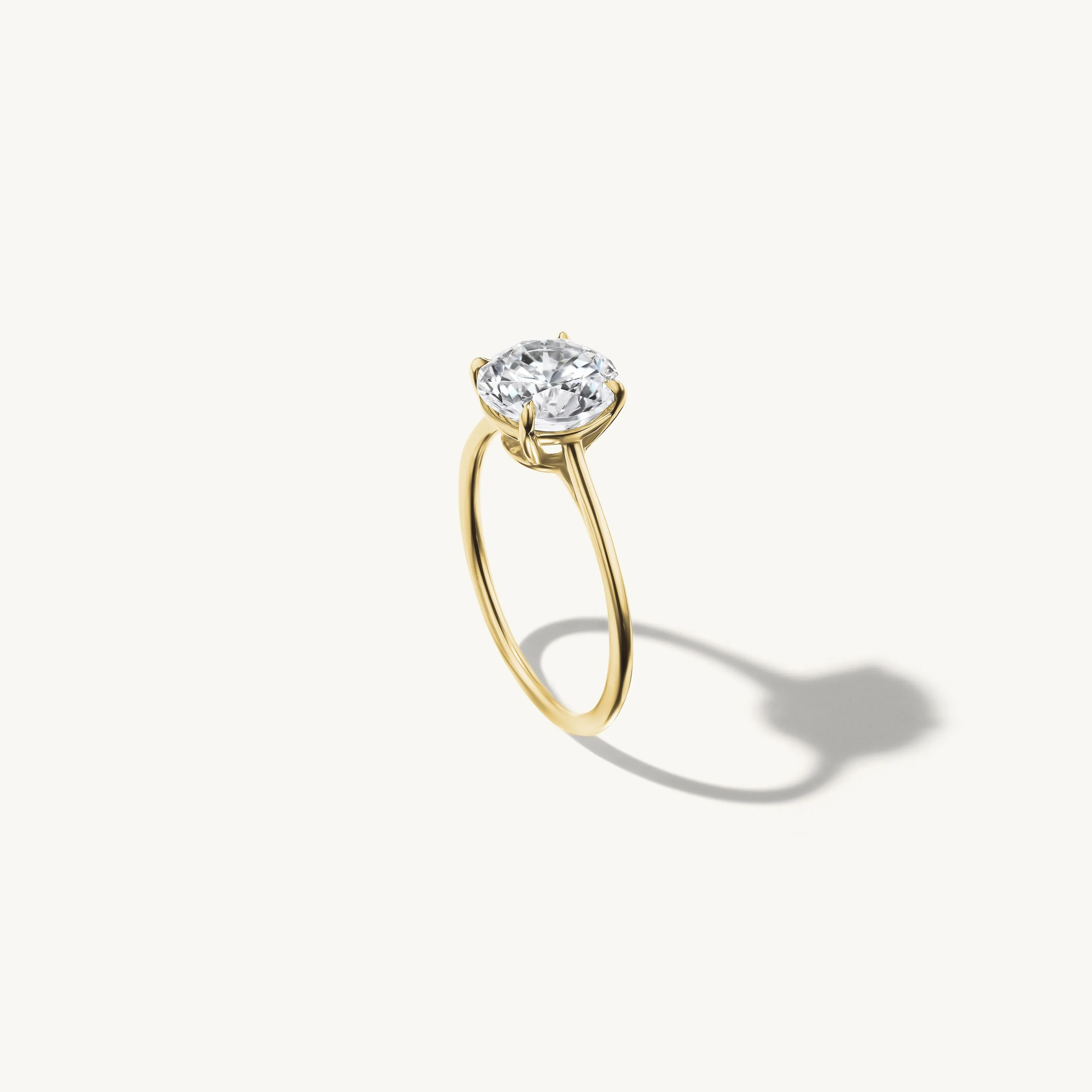 Floating Round Engagement Ring