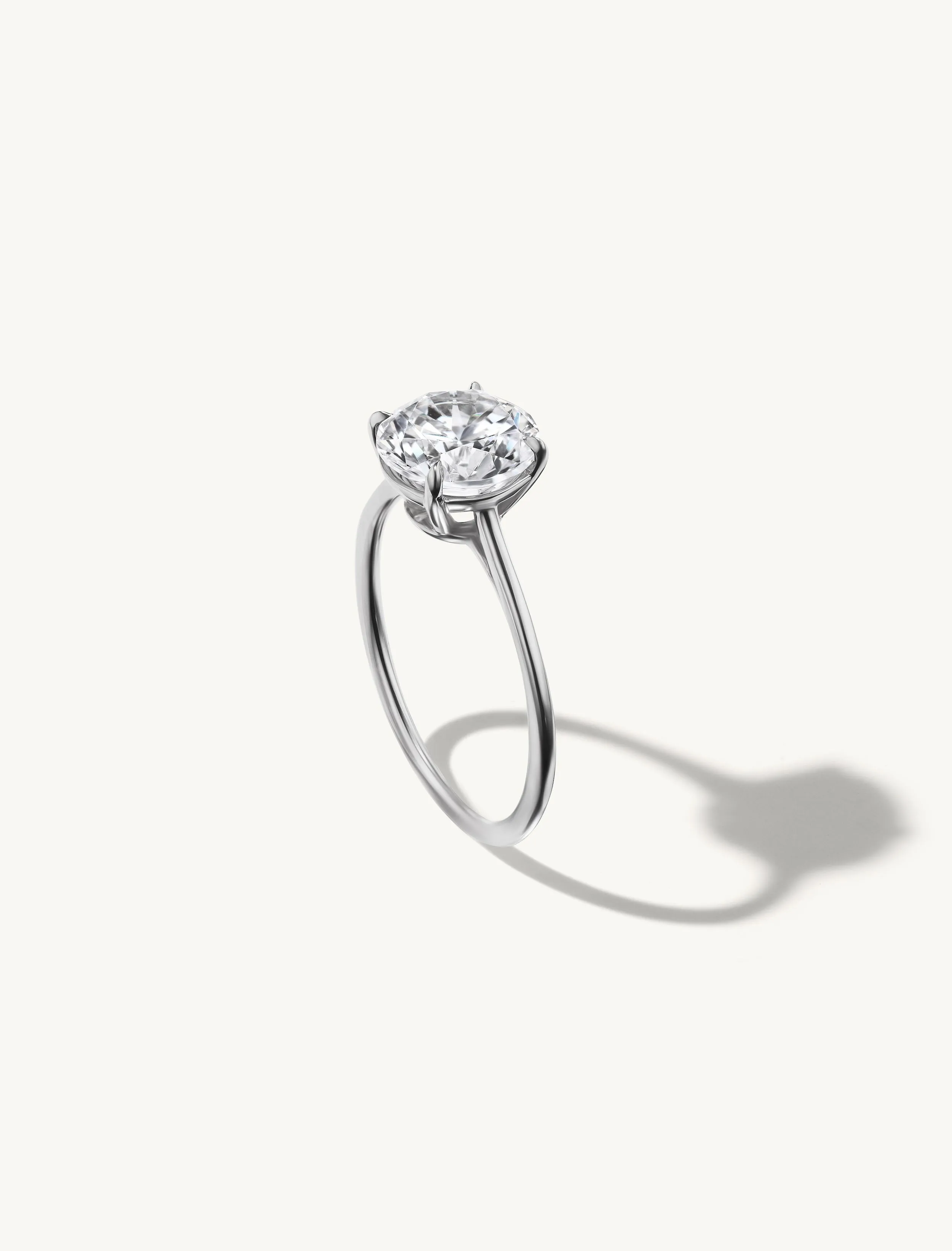 Floating Round Engagement Ring