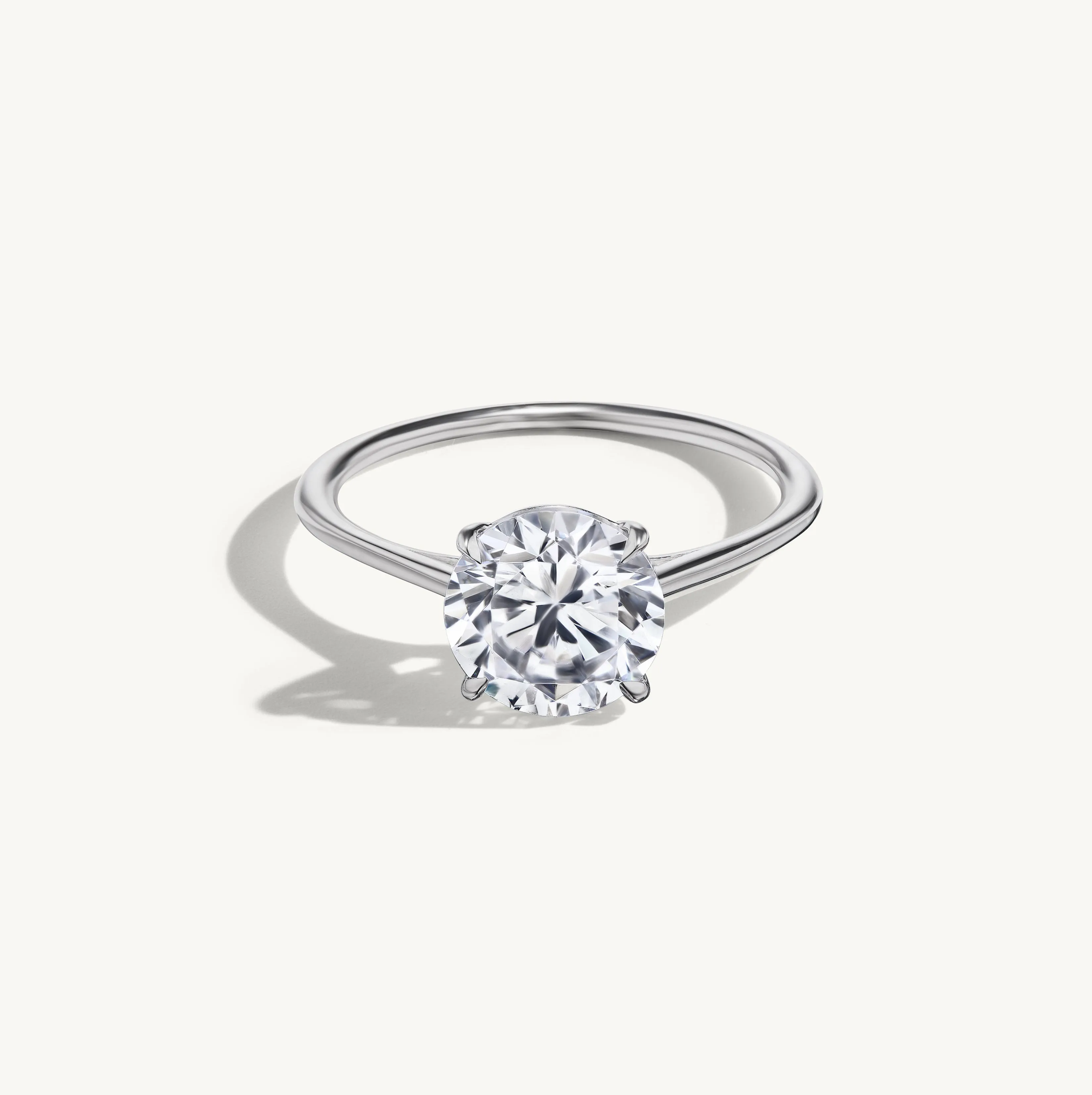 Floating Round Engagement Ring