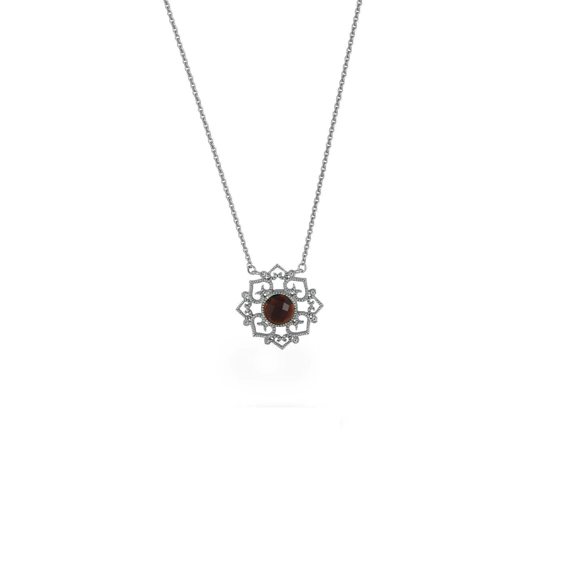 Garnet and Diamond Accent Necklace in Sterling Silver